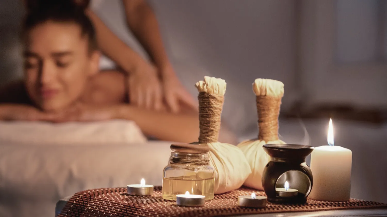 A calm Thai massage session at home